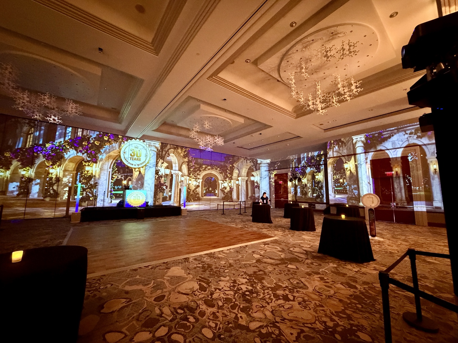 A ballroom transformed with projection across its walls