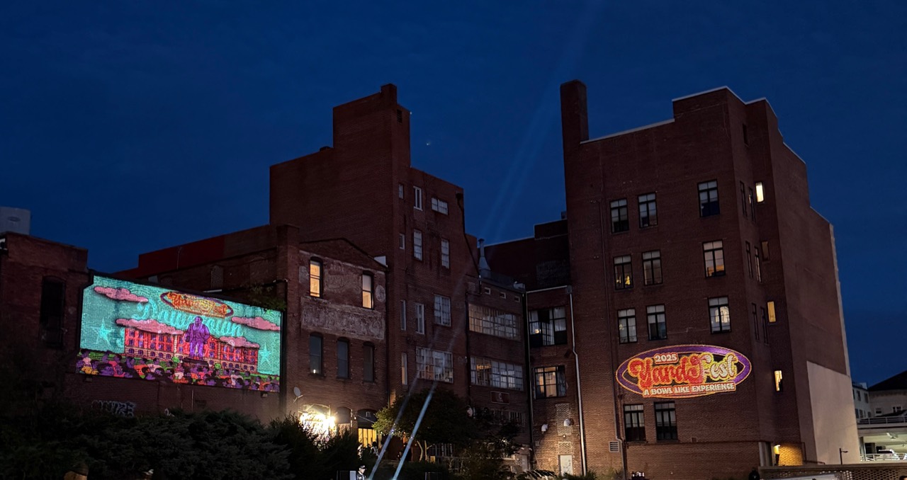 Outdoor festival projection across building facades